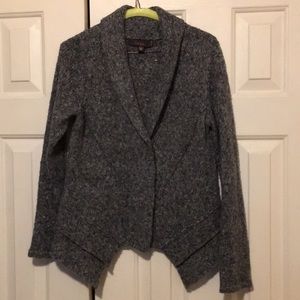 soft material sweater with snap front closures